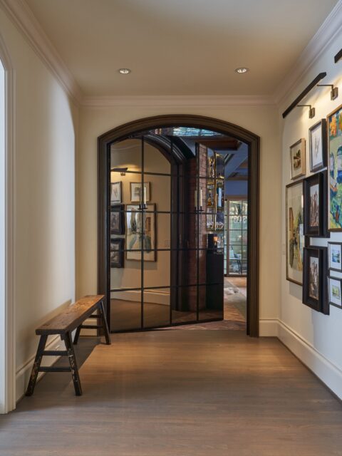 Without looking twice, you’d never know that behind this door lives a gilded, sapphire speakeasy that steals the show and transports you to your own after-hours escape. The @staltimber door holds the illusion until you push through.